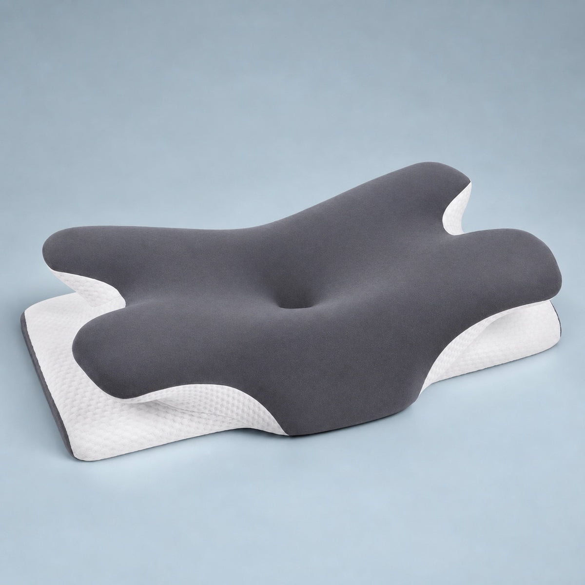 Cooling contour memory foam pillow on a clean light background